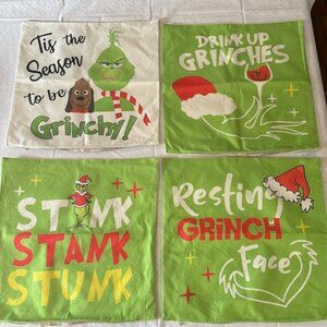 Four 17 x 17 grinch pillow covers, with zipper closings